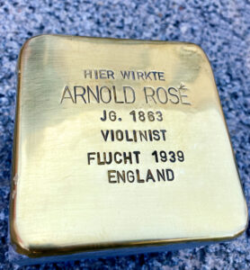 <p>HIER WIRKTE<br />
ARNOLD ROSÉ<br />
JG. 1863<br />
VIOLINIST<br />
FLUCHT 1939<br />
ENGLAND</p>